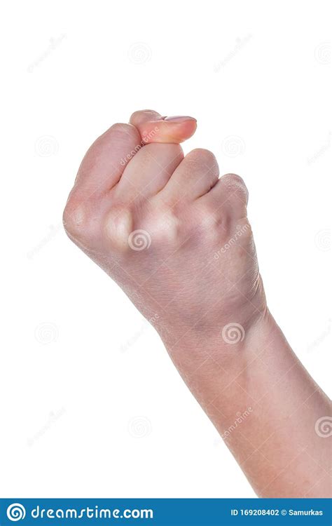 Female Hand With Fingers Folded Into Fist Isolated On White Background