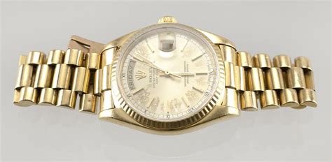 Lot ROLEX OYSTER PERPETUAL DAY DATE 18KT GOLD MAN S WRIST WATCH
