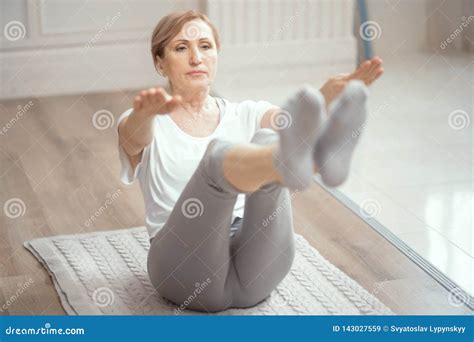 Cheerful Mature Woman Making Yoga Exercises Stock Image Image Of Room