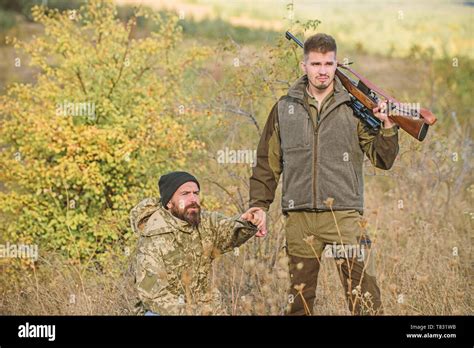 Poaching concept. Activity for brutal men. Hunters brutal poachers