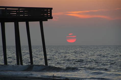 Big Red Sun At The 14th Street Pier Photograph By Bill Cannon Fine