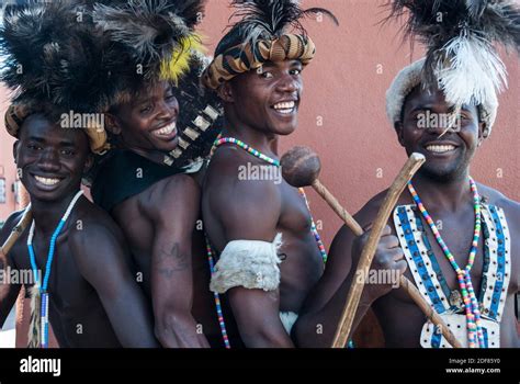 Zambian Troupe Dancers In Traditional Dress Happily Posing For A