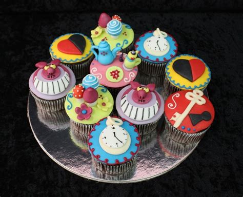 The last time i had watched it, i was a little kid and half the movie went right over my head while the other half scared me. Alice In Wonderland Cupcakes - CakeCentral.com