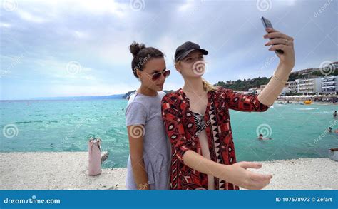 Funny Female Friends On Vacation Taking Selfies On The Beach Stock Image Image Of Selfies