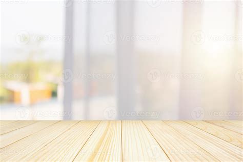 Empty Wood Table Top With Window Curtain Abstract Blur Background For