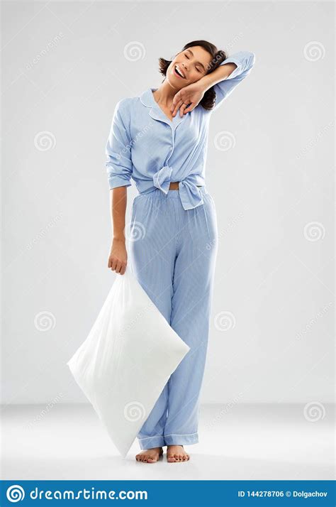 Happy Sleepy Woman In Blue Pajama Holding Pillow Stock Photo Image Of