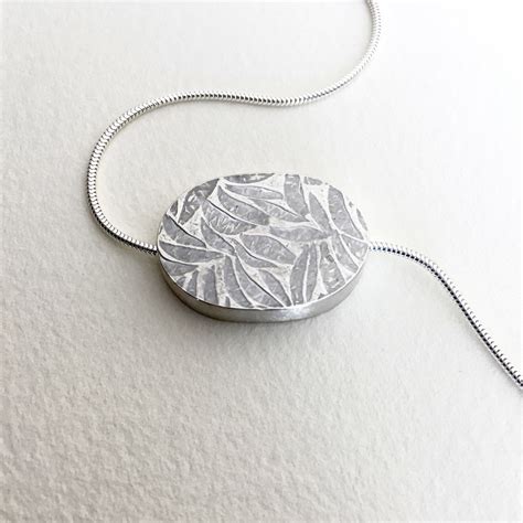Embossed Fine Silver Petals Pendant Artisan Jeweller Julie Bailey