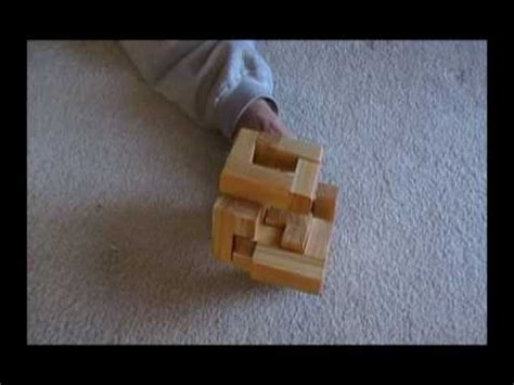 Very simple if you know what your doing. Solve the wooden block century cube puzzle - YouTube