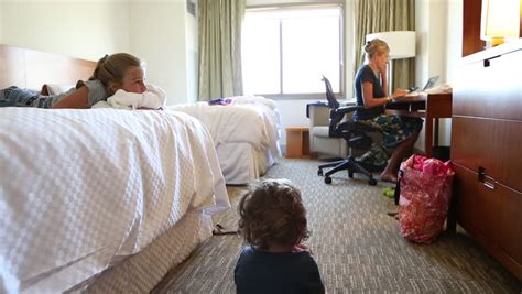 Mother With Daughter And Son In Hotel Room Stock Footage Video 13580753