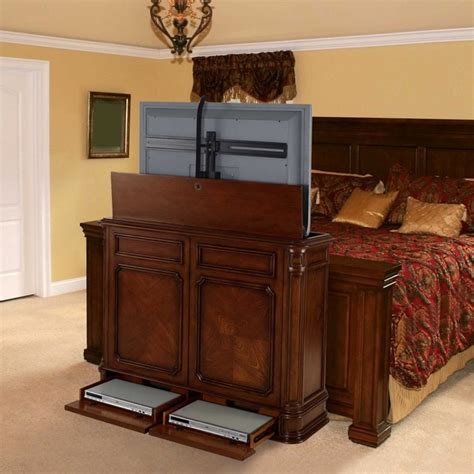 The motorized tv stand and tv lift cabinets for flat screens allow you to bring out your flat screen when you desire. TV Lift Cabinets in Homes - Traditional - Bedroom - Miami ...