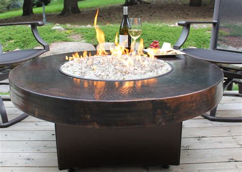 A wine barrel/wire spool table fire pit. Tabletop Fire Pit DIY | FIREPLACE DESIGN IDEAS