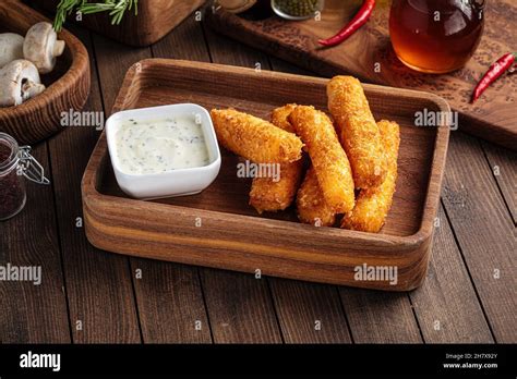 Deep Fried Mozzarella Cheese Sticks With Sauce Stock Photo Alamy