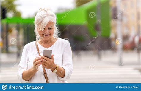 Senior Woman Using Smartphone In The City Stock Image Image Of Cityn