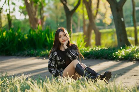 images blurred background female asian sitting staring