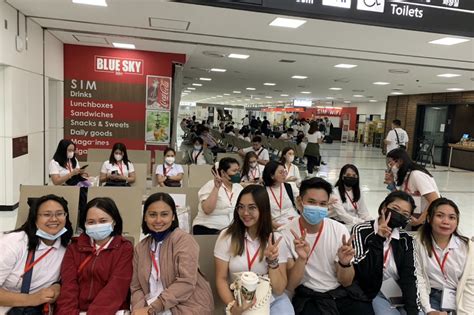 228 filipino health workers arrive in japan for training work abs cbn news