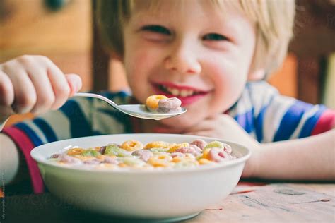 Child Eating Breakfast Cereal Del Colaborador De Stocksy Sally