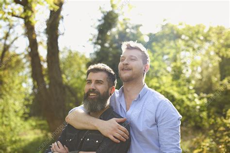 affectionate male gay couple hugging stock image f022 3234 science photo library