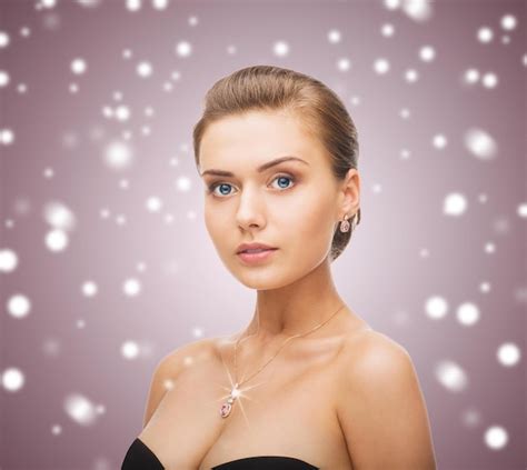 Premium Photo Beauty People And Jewelry Concept Woman Wearing Shiny Diamond Earrings And