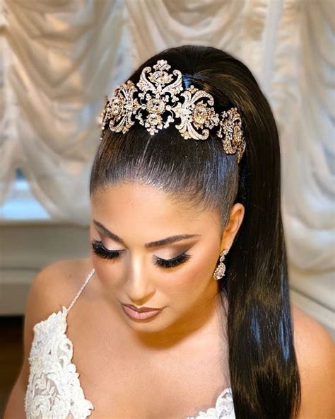regal bride dazzling in a custom crystal crown with gold accents gorgeous hair bridal styles