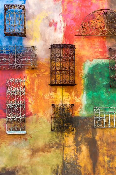 Metal Gates On Colored Wall Photo By Jason Leung