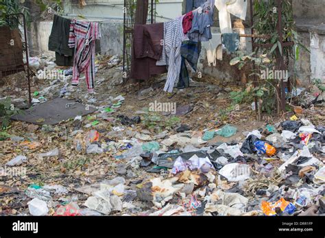 Slum Housing And Garbage In Ahmedabad India Stock Photo Alamy