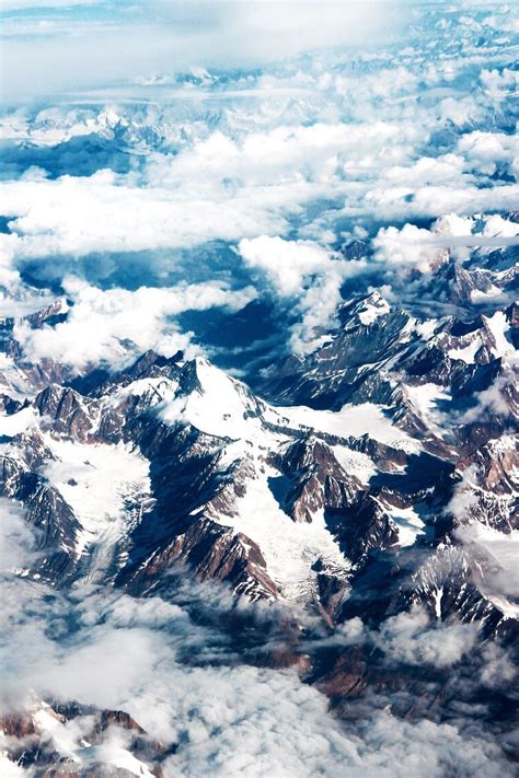 Aerial View Of Snow Covered Mountains Id 93524973