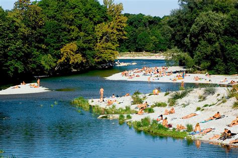 People Sunbathing Nude At The Banks Of License Image