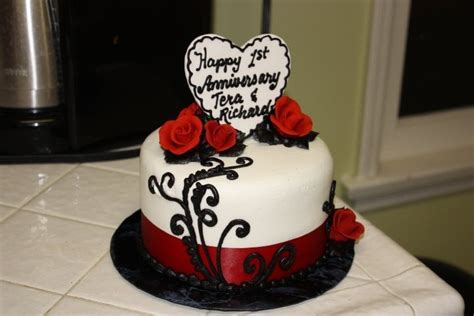Have the couple cut the cake together and be sure to have photos taken. One Year Anniversary Cake - Yelp