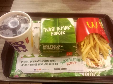 Share if you love indulging occasionally and do comment and let us know your favourite stall. Somewhere in Singapore Blog: McDonald's Nasi Lemak Burger