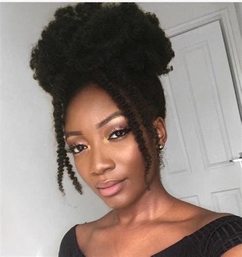 Curly buns come in many varieties and are a cute and chic style. 25 Easy-to-Do Curly Updos for Any Occasion | Natural hair ...