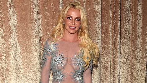 britney spears dazzles in a sheer dress at the clive davis pre grammys gala pics