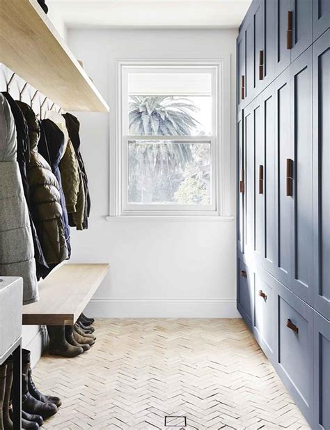 Even though it's a temporary solution, she reasons that the elfa shelving can always be taken down and reused elsewhere when she's ready to commit to a custom build. How to Create a Mudroom in the Garage (May, 2021) - So ...
