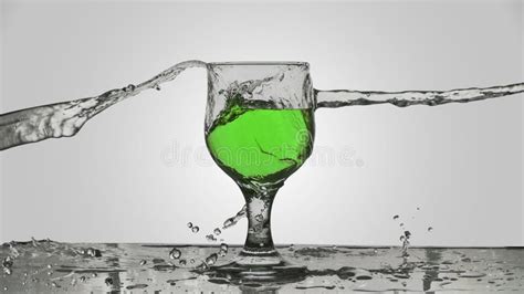 Water Splashed On A Glass Of Green Wine Stock Photo Image Of Falling