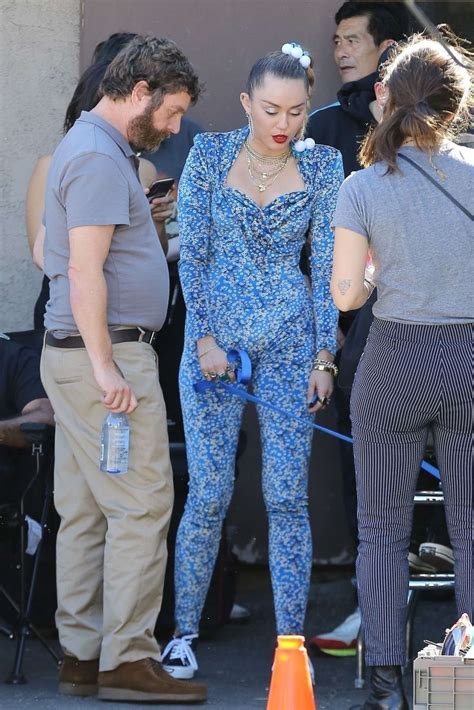 Miley Cyrus In Blue Floral Jumpsuit 07 Gotceleb
