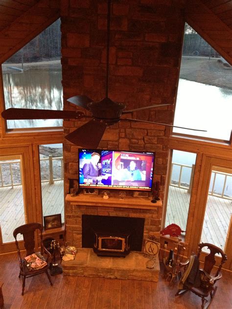 A professional from your area would know all of the local codes that you are required to meet, as well as the national ones. Rock fireplace from loft area. | Fireplace, Rock ...
