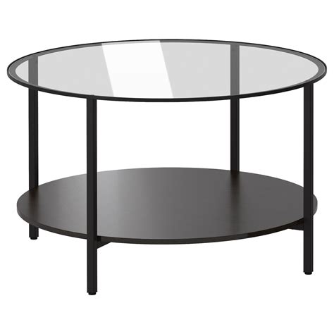 A classic glass side table can give your space a sense of glamour. VITTSJÖ Coffee table, black-brown/glass, 75 cm - IKEA