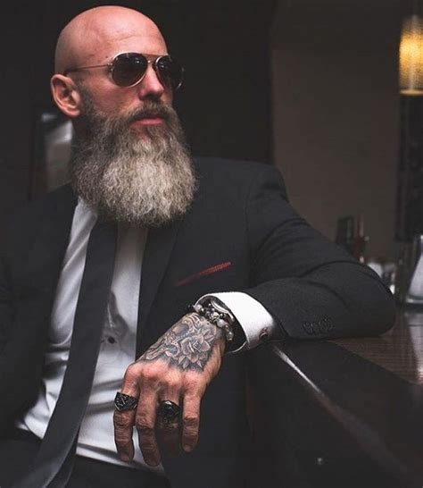 The bald head on its own already looks tough with the ridges of a skull showing under the skin, and add to that a thick beard. The Best Beard Styles For Bald Men (Balding With A Beard ...