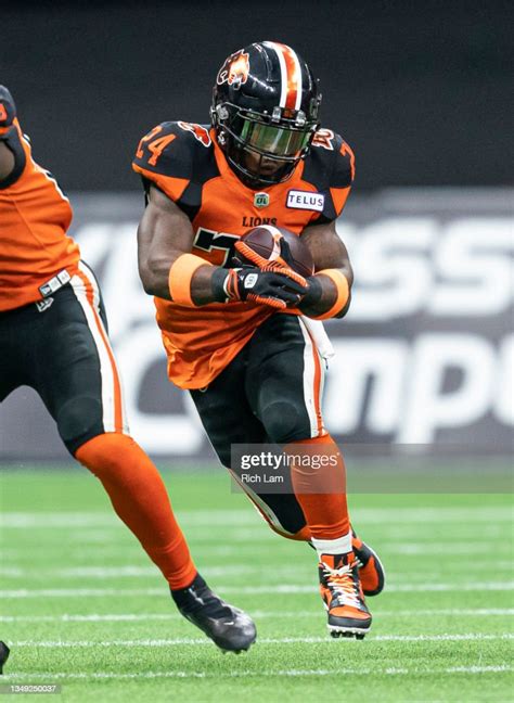 James Butler Of The Bc Lions Runs With The Football During Cfl News