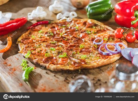 Italian Pizza With Pepperoni — Stock Photo © Arturverkhovetskiy 150956290