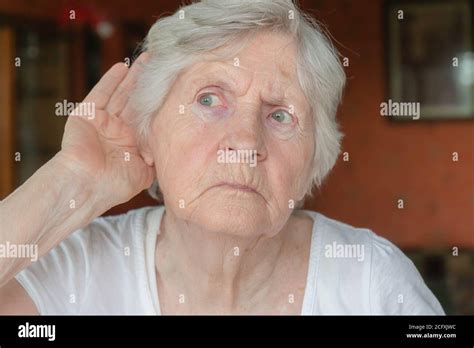 Hand Ear Listen Senior Hi Res Stock Photography And Images Alamy