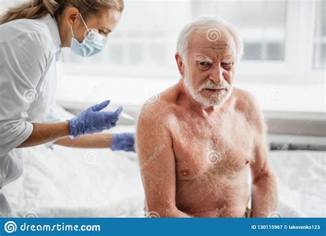 Home · one shot men's clinic. Shirtless Old Man Receiving Injection In Back Stock Image - Image of health, grimace: 130115967