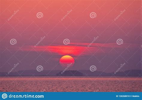 Red sunset over lake. stock photo. Image of cloud, outdoor - 126268010