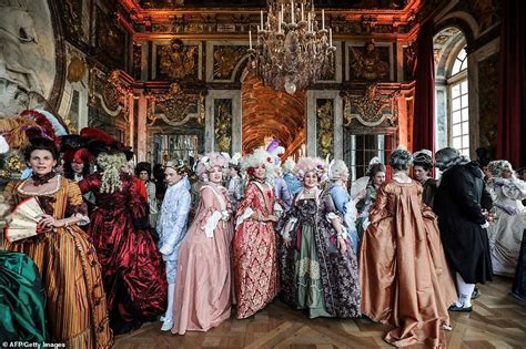 Guests Don Decadent Period Costume As They Party In Versailles Palace