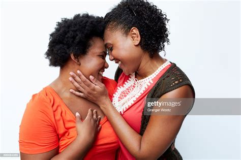 Smiling Mother And Daughter Hugging Photo Getty Images