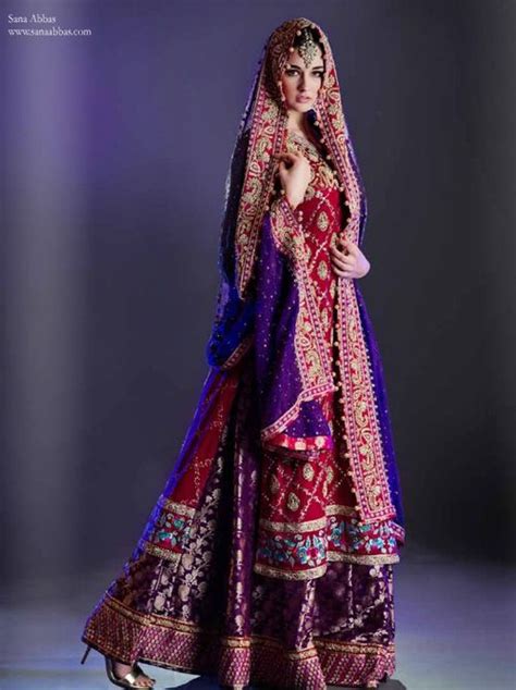 The common thing between bride and. Purple lengha | Pakistani wedding dresses