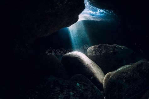 Underwater Rocky Cave In Ocean With Sun Rays Stock Photo Image Of