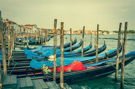 Gondolas Moored By Saint Mark Square Venice Italy Europe Stock Photo