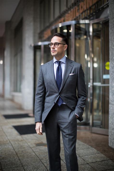 At the vertical suite, every effort is made to make guests feel comfortable. All Business: The Classic Charcoal Grey Suit - He Spoke Style
