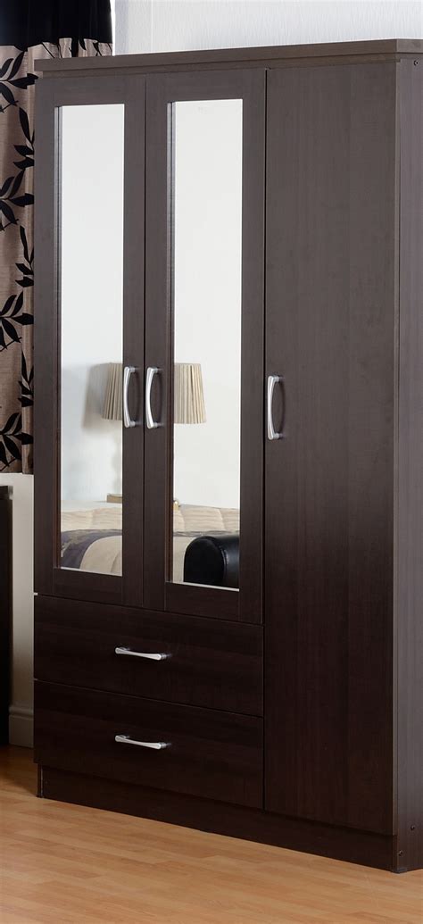 Three door sliding wardrobe with center mirror, sliding three door wardrobe with center glass, oak finish three door sliding wardrobe design, elegant sliding wardrobes design ideas around the world for your home. Three door wardrobe with double mirror | Wardrobe design ...