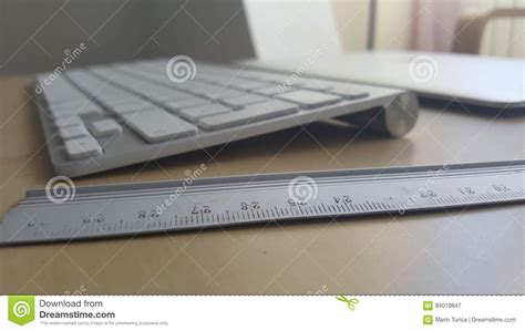 Office Desk Table With Keyboard Ruler And Laptop Stock Image Image